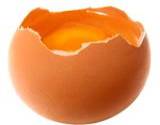 a photo of a fresh brown egg wit top cracked off a natural source of vitamin B1