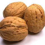 photo of three walnuts a natural  source of valine