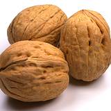 photo of three walnuts a natural  source of valine